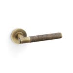 Alexander & Wilks Spitfire Knurled Lever on Round Rose - Antique Brass
