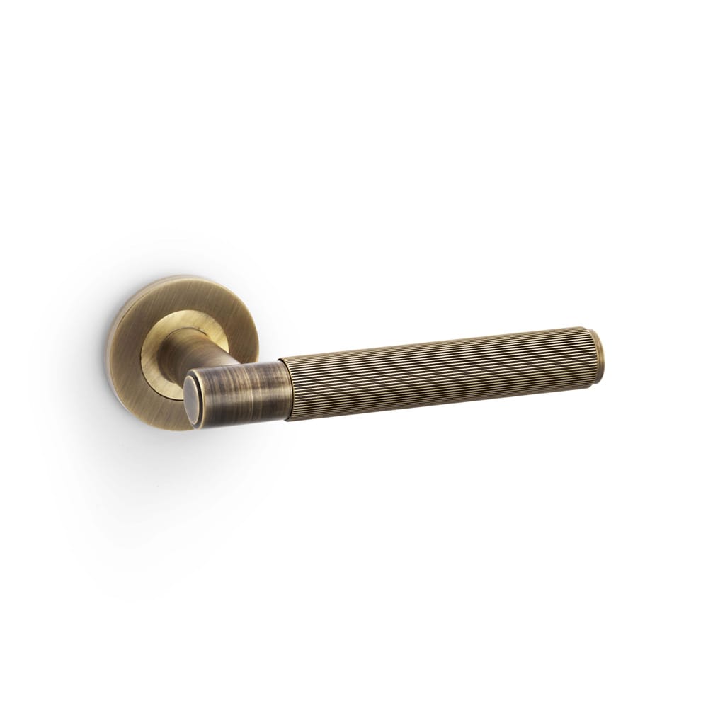 aw222ab.jpg Alexander & Wilks Spitfire Reeded Lever on Round Rose - Antique Brass - Image 1