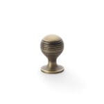 Alexander & Wilks Caesar Cupboard Knob on Round Rose - Antique Brass - 25mm