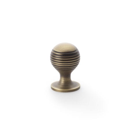 Alexander & Wilks Caesar Cupboard Knob on Round Rose - Antique Brass - 25mm