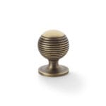Alexander & Wilks Caesar Cupboard Knob on Round Rose - Antique Brass - 32mm