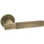 Yester Bronze Millhouse Brass Crompton Knurled Lever Door Handle on 5mm Slimline Round Rose - (MHSR100YB)