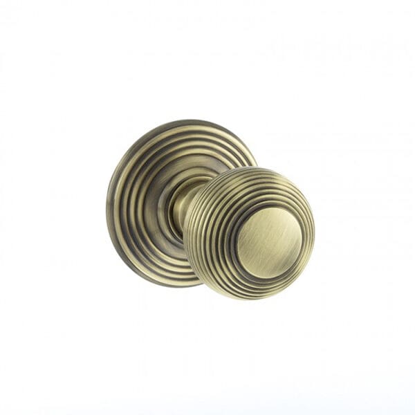 Atlantic Antique Brass Old English Ripon Solid Brass Reeded Beehive Mortice Door Knob on Concealed Fix Rose - (OE50RMKAB)