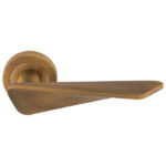 Manital Intona Lever on Round Rose - Antique Brass (IN5AB)