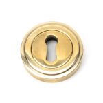 From the Anvil Aged Brass Round Escutcheon (Art Deco)