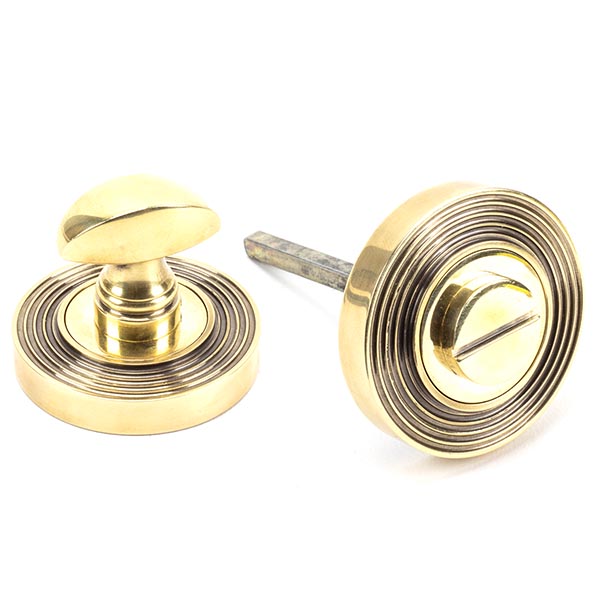 From the Anvil Aged Brass Round Thumbturn Set (Beehive)