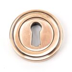From the Anvil Polished Bronze Round Escutcheon (Art Deco)
