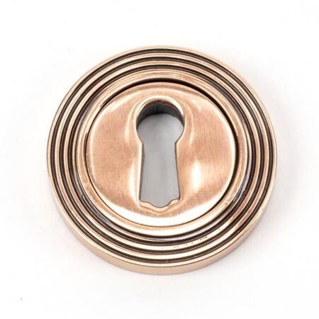 From the Anvil Polished Bronze Round Escutcheon (Beehive)