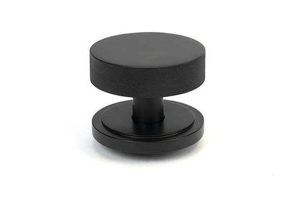 From the Anvil Matt Black Brompton Centre Door Knob (Art Deco)