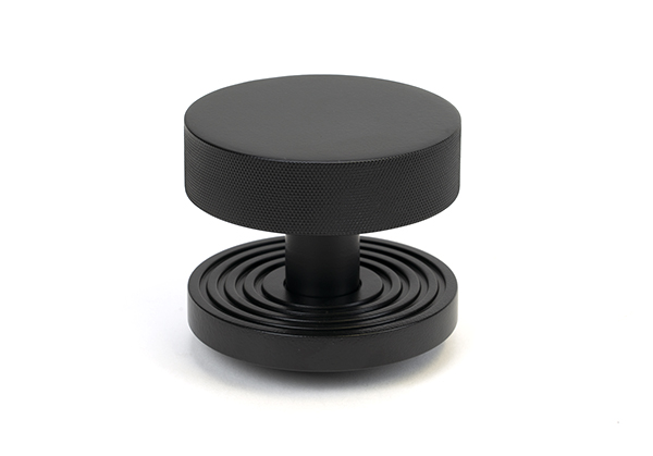 From the Anvil Matt Black Brompton Centre Door Knob (Beehive)