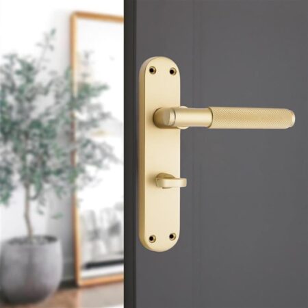Spira Brass Satin Brass Connaught Knurled Lever on Backplate Privacy Door Handle Set - Image 3