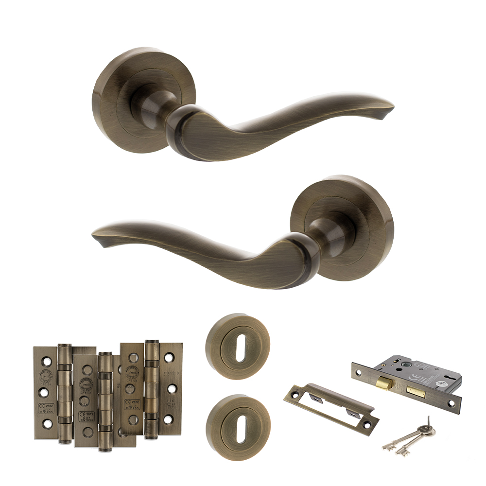 ADPOE178AB14_OLD-ENGLISH-WARWICK-ANTIQUE-BRASS.jpg Atlantic Old English Warwick Door Handle Pack (3 Lever Lock Set - 2.5" CE Sashlock, 3" Fire Rated Hinges x3) - Antique Brass - Image 1