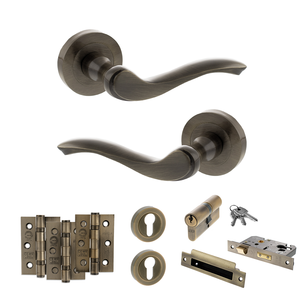 ADPOE178AB20_OLD-ENGLISH-WARWICK-ANTIQUE-BRASS.jpg Atlantic Old English Warwick Door Handle Pack (Euro Lock Set - 2.5" CE Sashlock, 3" Fire Rated Hinges x3) - Antique Brass - Image 1