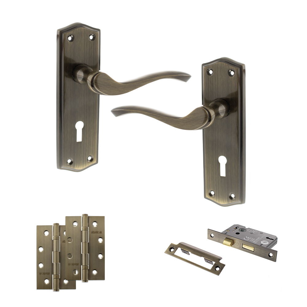 ADPOE178KAB19_OLD-ENGLISH-WARWICK-ANTIQUE-BRASS.jpg Atlantic Old English Warwick Door Handle Pack (3 Lever Lock Set - 3" CE Sashlock, 4" Slim Knuckle Hinges x2) - Antique Brass - Image 1