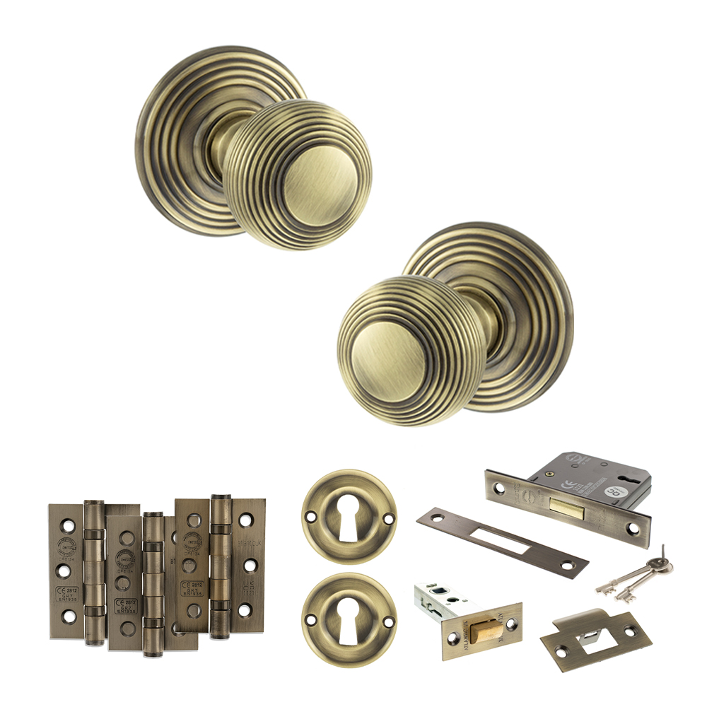 ADPOE50RMKAB66_OLD-ENGLISH-RIPON-ANTIQUE-BRASS.jpg Atlantic Old English Ripon Door Knob Pack (Lock Set - 3" Latch & Deadlock, 3" Fire Rated Hinges x3) - Antique Brass - Image 1