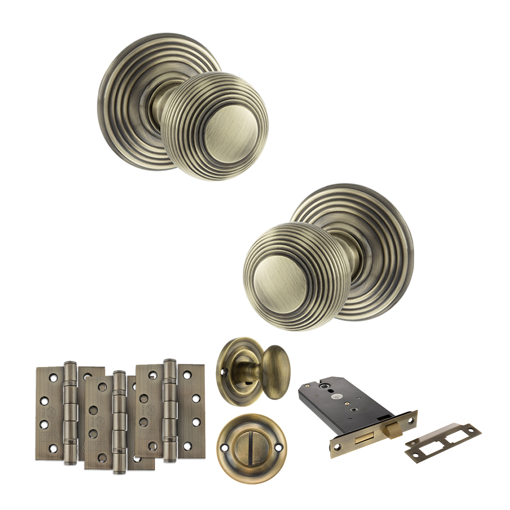 ADPOE50RMKAB72_OLD-ENGLISH-RIPON-ANTIQUE-BRASS.jpg Atlantic Old English Ripon Door Knob Pack (Lock Set - Horizontal Bathlock, 4" Fire Rated Hinges x3) - Antique Brass - Image 1