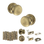 Atlantic Old English Harrogate Door Knob Pack (Bathroom Set - 4" Deadbolt, 4" Fire Rated Hinges x3) - Antique Brass
