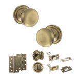 Atlantic Old English Harrogate Door Knob Pack (Bathroom Set - 4" Deadbolt, 4" Slim Knuckle Hinges x2) - Antique Brass