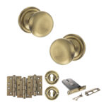Atlantic Old English Harrogate Door Knob Pack (Lock Set - Horizontal Sashlock, 4" Fire Rated Hinges x3) - Antique Brass