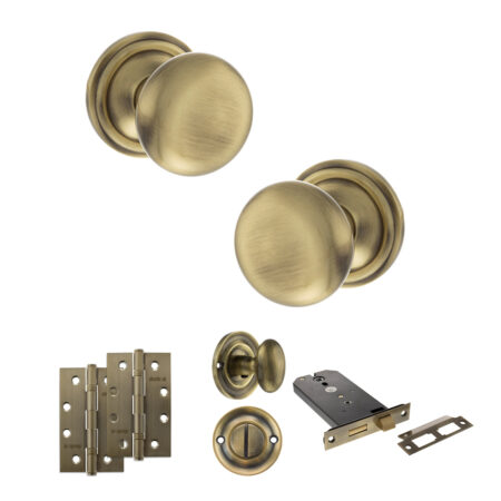 Atlantic Old English Harrogate Door Knob Pack (Lock Set - Horizontal Bathlock, 4" Slim Knuckle Hinges x2) - Antique Brass