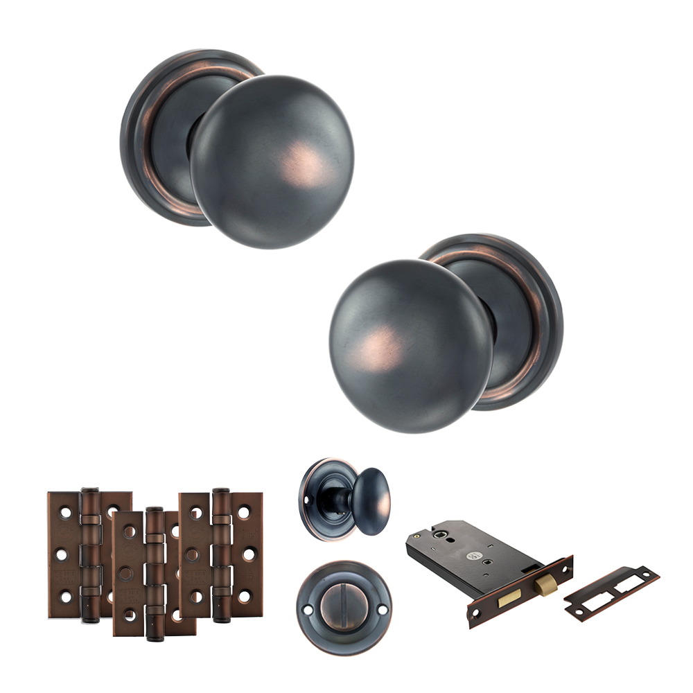 ADPOE58MMKAC70_OLD-ENGLISH-HARROGATE-ANTIQUE-COPPER.jpg Atlantic Old English Harrogate Door Knob Pack (Lock Set - Horizontal Bathlock, 3" Fire Rated Hinges x3) - Antique Copper - Image 1