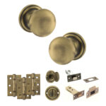 Atlantic Old English Harrogate Door Knob Pack (Bathroom Set - 3" Deadbolt, 3" Fire Rated Hinges x3) - Matt Antique Brass