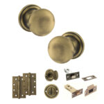 Atlantic Old English Harrogate Door Knob Pack (Bathroom Set - 3" Deadbolt, 4" Slim Knuckle Hinges x2) - Matt Antique Brass