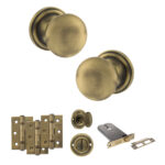 Atlantic Old English Harrogate Door Knob Pack (Lock Set - Horizontal Bathlock, 3" Fire Rated Hinges x3) - Matt Antique Brass