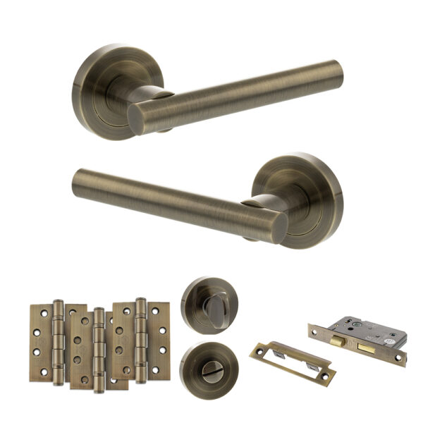 STATUS Nebraska Door Handle Pack (Bathroom Set - 2.5" CE Bathroom Lock, 4" Fire Rated Hinges x3) - Antique Brass