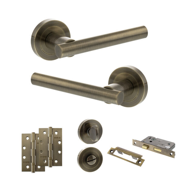 STATUS Nebraska Door Handle Pack (Bathroom Set - 3" CE Bathroom Lock, 4" Slim Knuckle Hinges x2) - Antique Brass
