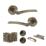 STATUS Indiana Door Handle Pack (Bathroom Set - 2.5" CE Bathroom Lock, 3" Fire Rated Hinges x3) - Antique Brass