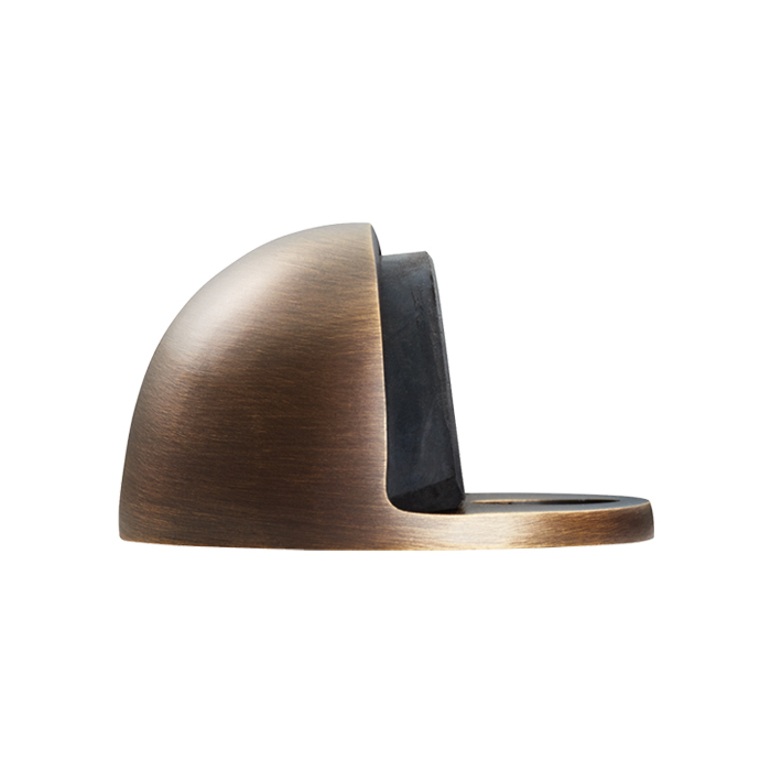 aa20ab.jpg Carlisle Brass Floor Mounted Oval Doorstop - Antique Brass - Image 1