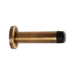 Carlisle Brass Wall Mounted Cylinder Doorstop with Rose - Antique Brass